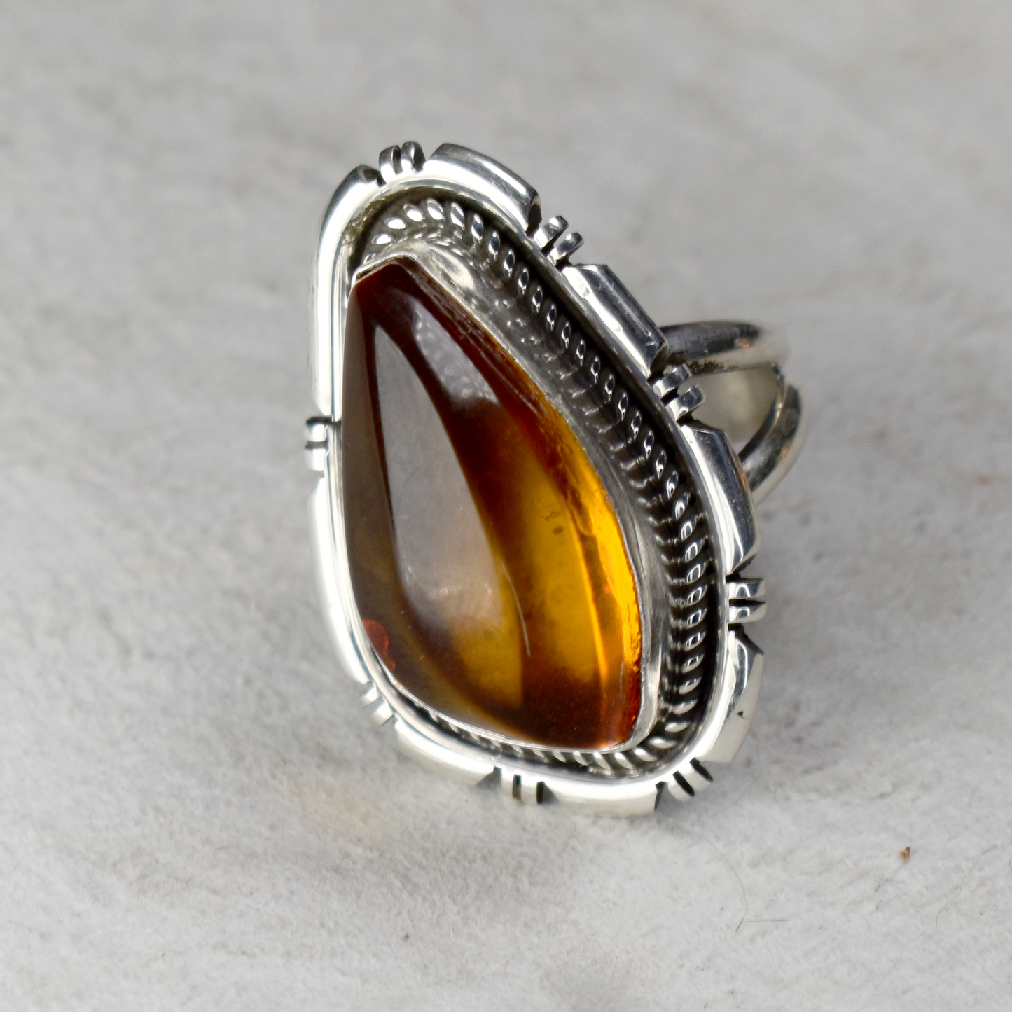 Asymmetrical Amber Ring with Hand-Etched Border by Glenn & Irene Sandoval