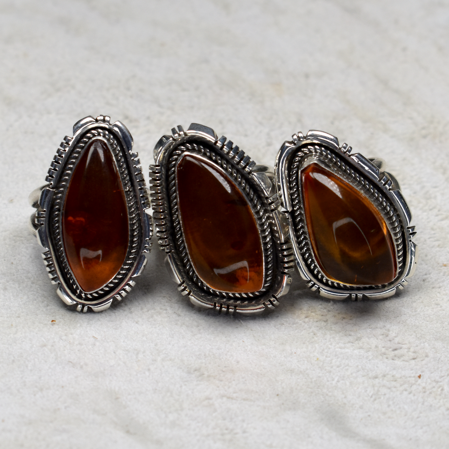 Asymmetrical Amber Ring with Hand-Etched Border by Glenn & Irene Sandoval