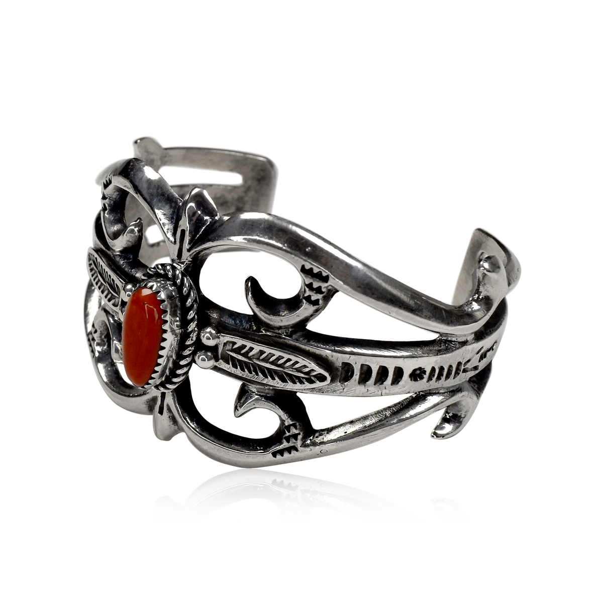 Tufa Cast Stamped Cuff with Red Coral by Eugene S. Mitchell