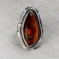 Asymmetrical Amber Ring with Hand-Etched Border by Glenn & Irene Sandoval