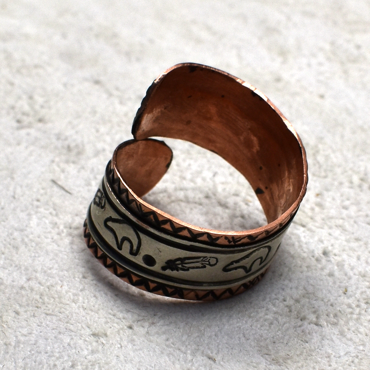 Copper and Nickel Wraparound Ring with Bear & Feather Stamping by A. Begay