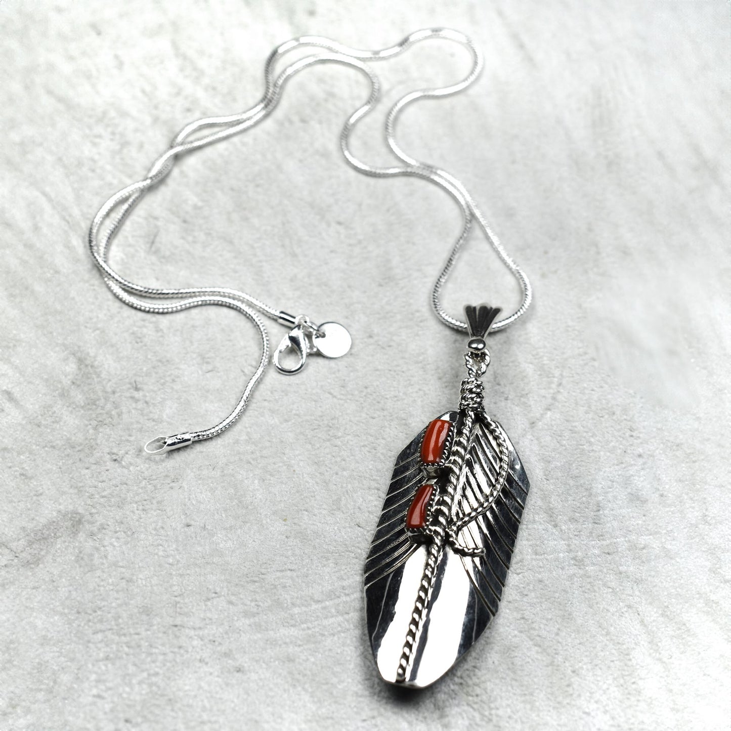 Prayer Feather Pendant Necklace with Noble Coral Baguette Inlay by Mathilda Benally