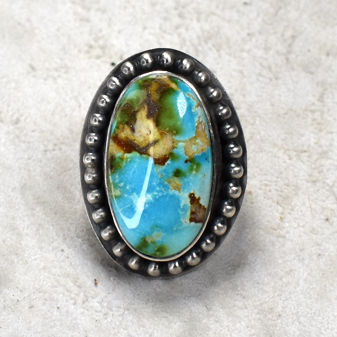 High Grade Golden Hills Turquoise Oval Hand-Tooled Ring by Gilbert Nez