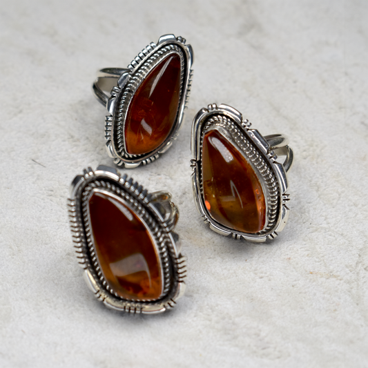 Asymmetrical Amber Ring with Hand-Etched Border by Glenn & Irene Sandoval