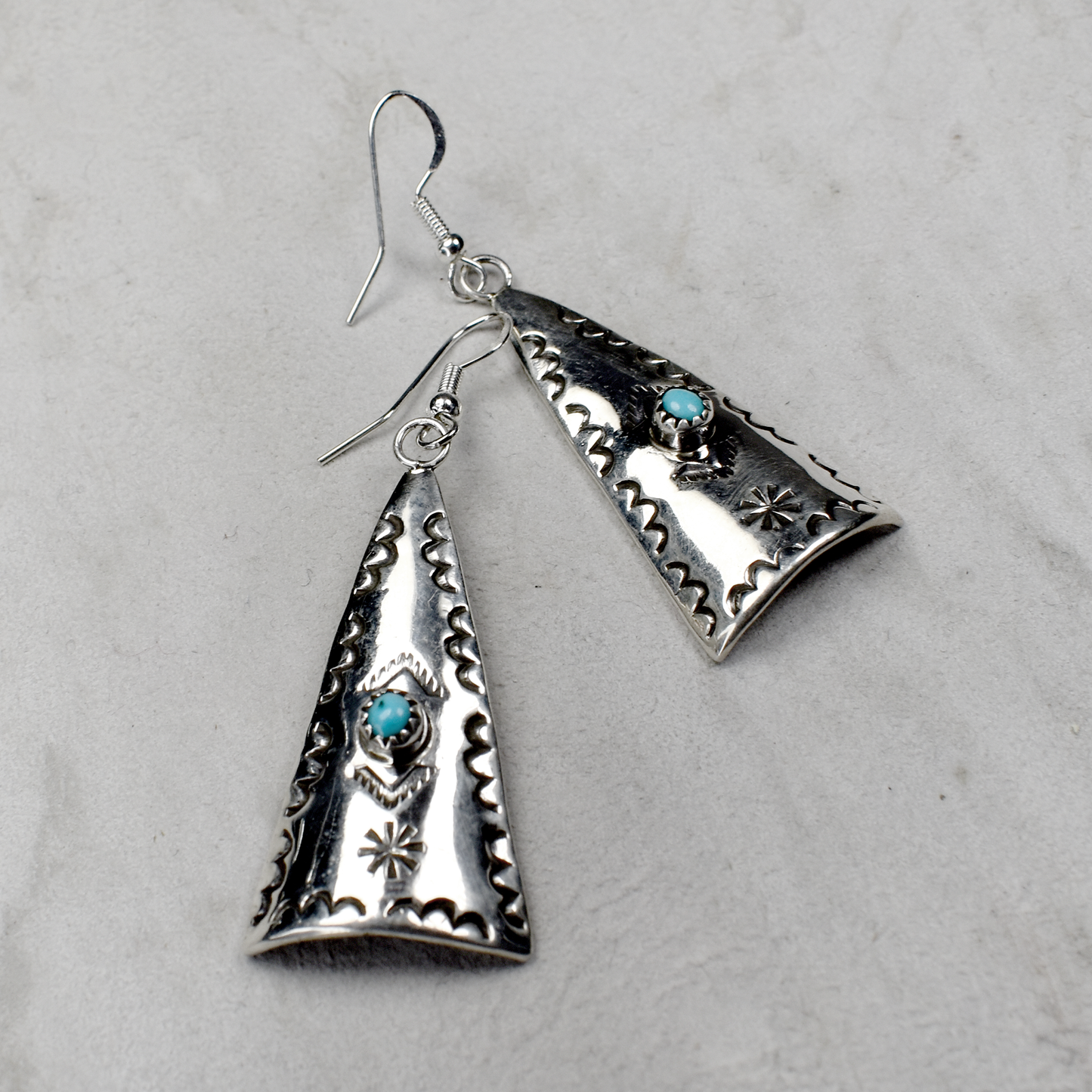 Hand Stamped Triangular Sand Cast Earrings with Sleeping Beauty Turquoise Inlay by Pauline Nelson