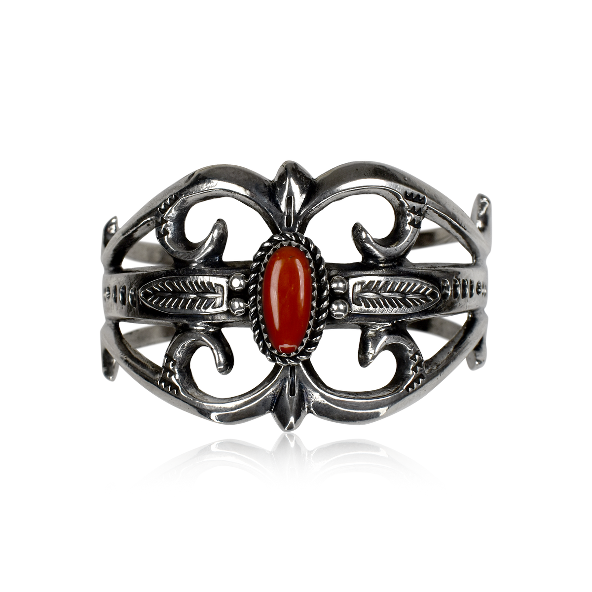 Tufa Cast Stamped Cuff with Red Coral by Eugene S. Mitchell
