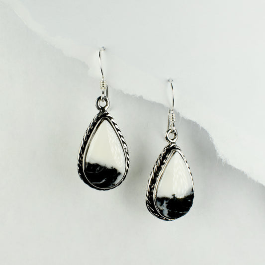 White Buffalo Teardrop Earrings with Rope Border