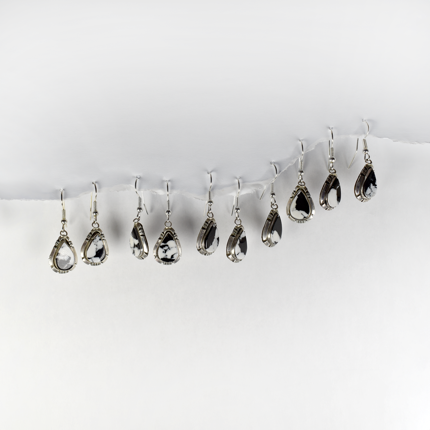 White Buffalo Teardrop Earrings by Calvin Spencer