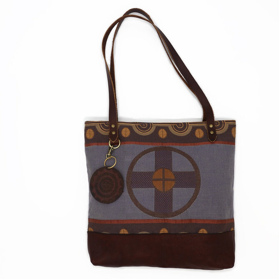 Mahota textiles for the creater tote bag made from blanket pattern with leather bottom and straps cross in center for the creator of the universe purse