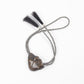 2014 prix de west bolo tie horsehair under the portal by doug hyde sculpture bronze