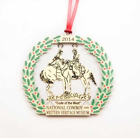 code of the west christmas ornament 2014 national cowboy museum store annual holiday ornament two cowboys on horses gold metal delicate stamped