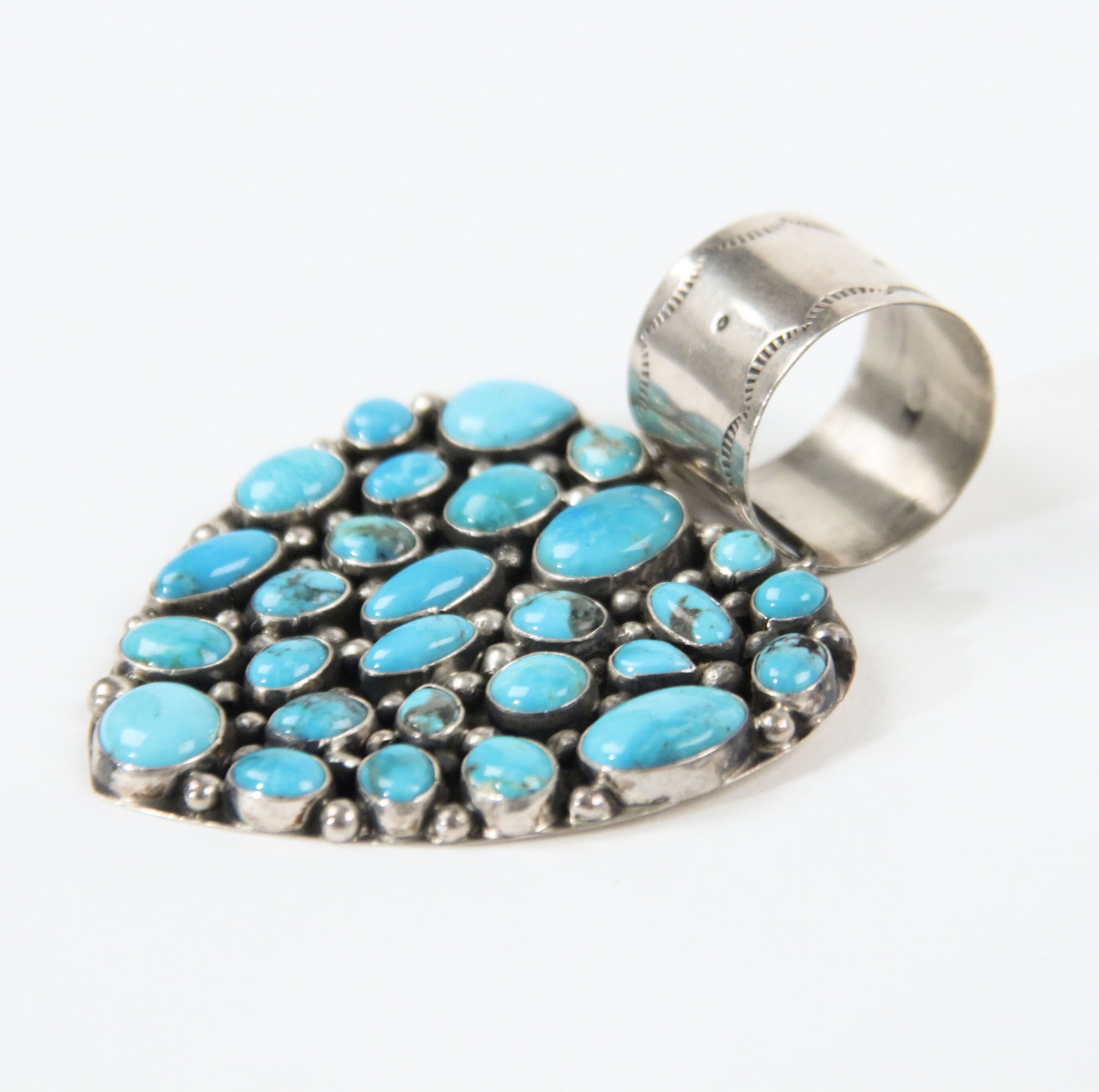 Turquoise heart pendant Rocki Gorman bold statement jewelry women western southwestern blue side view